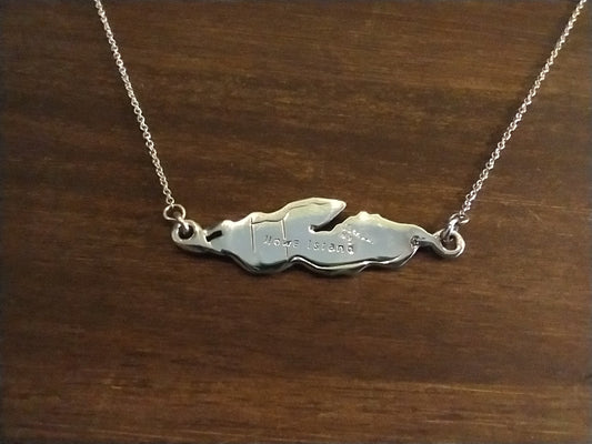 accurate outline of Howe Island in shiny sterling silver attached to a necklace chain from both ends