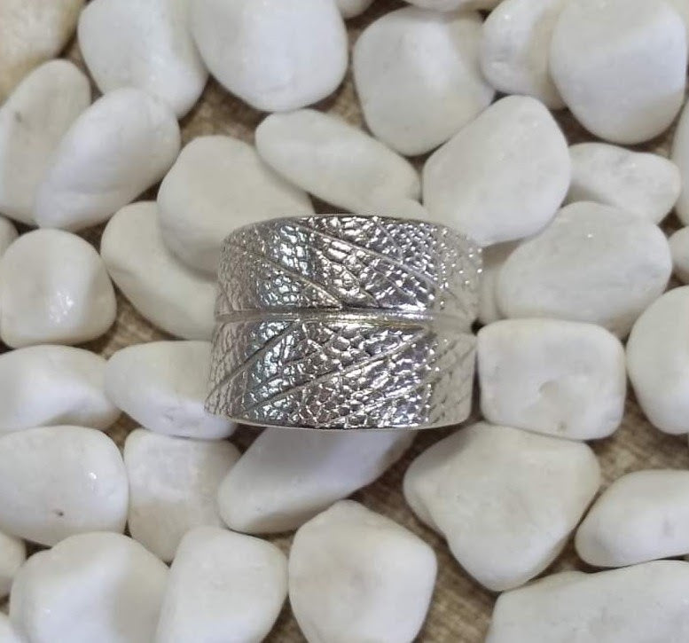close up of the soft fine detailing of the sage leaf captured in sterling silver for this ring