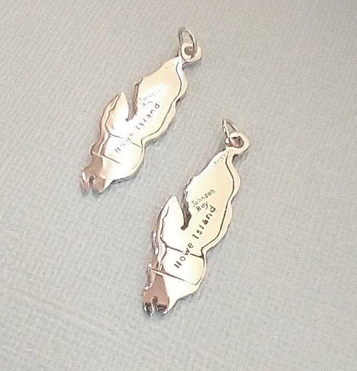 accurate outline of Howe Island in shiny sterling silver with hoop for attaching to a necklace chain from one end