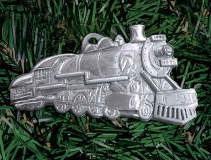 Finely detailed classic train engine, hand carved then die-cast in pewter (palm sized, flat)