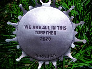 Back, bearing the words “we are all in this together 2020” (palm sized, round)