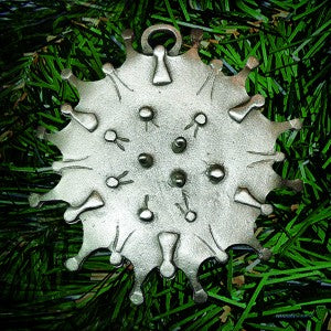 iconic spiked ball of coronavirus, hand carved then die-cast in pewter (palm sized, double-sided flat)