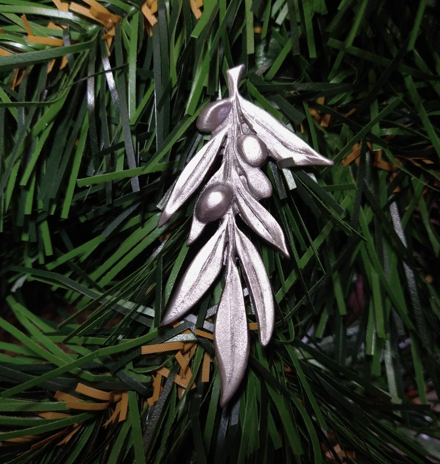 Finely detailed sprig of an olive branch with leaves and olives (palm sized, single-sided die-cast pewter)